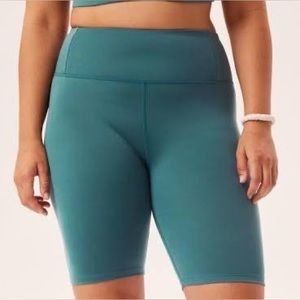 Blue/green FLOAT biker shorts. Girlfriend collective.